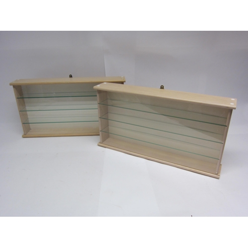 9220 - A pair of wall mounting collectors display cabinets with glass shelves and perspex sliding fronts