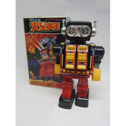 9072 - A boxed SH (Horikawa), Japan, battery operated plastic and tinplate robot with chest opening to reve... 