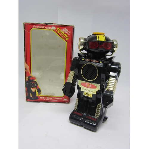 9070 - A boxed New Bright Tommy The Atomic Robot battery operated plastic robot, 26cm tall.