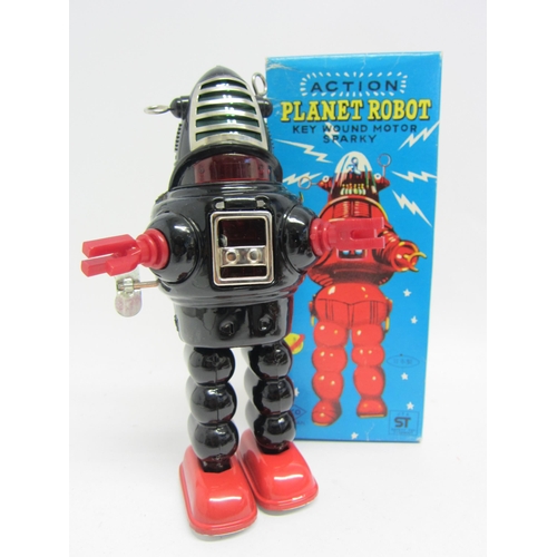 9078 - A KO (Yoshiya), Japan, Action Planet Robot, the black tinplate robot with red plastic arms and feet,... 