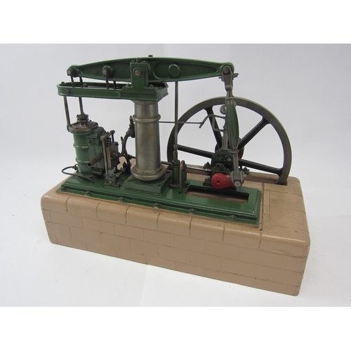 9557 - A well engineered live steam beam engine with single vertical cylinder, valve chest, flywheel (23.5c... 