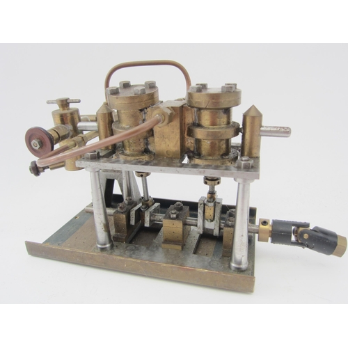 9555 - A live steam twin cylinder oscillating marine engine