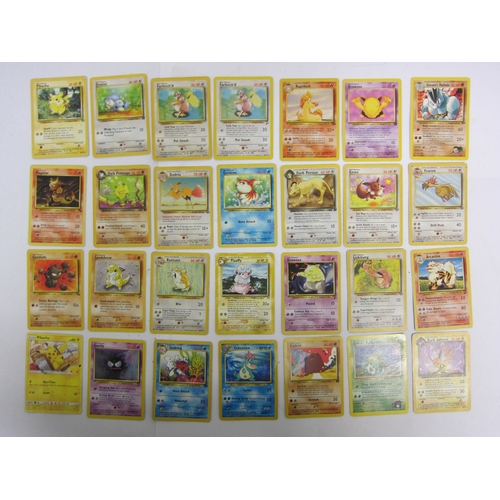 9019 - A collection of assorted Pokemon cards including base set Shadowless Holo Charizard (heavily worn), ... 