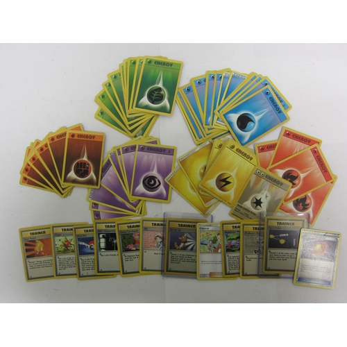 9019 - A collection of assorted Pokemon cards including base set Shadowless Holo Charizard (heavily worn), ... 