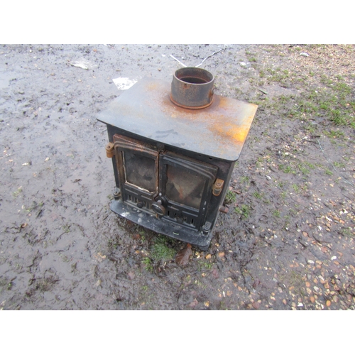 3259 - A cast wood burner