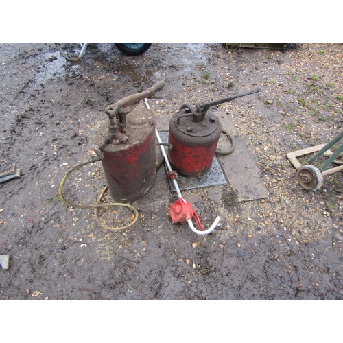 3275 - A barrel pump and two oil pumps