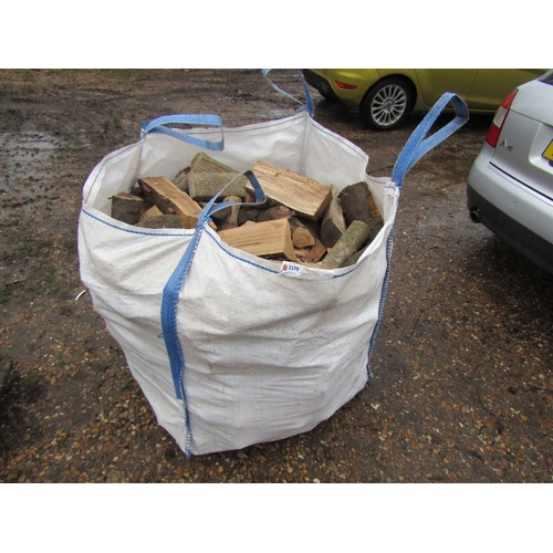 3279 - A one tonne bag containing logs