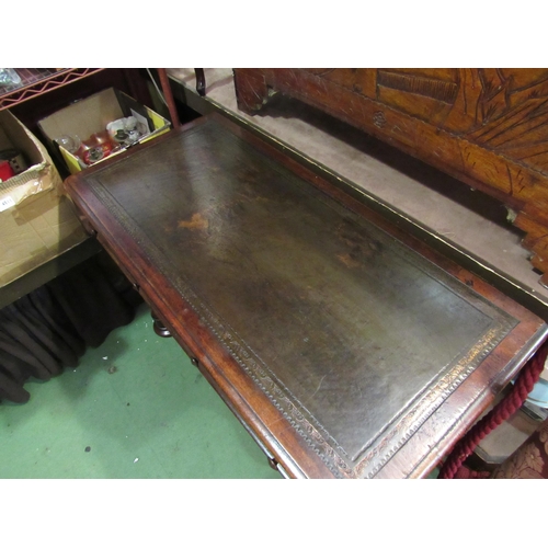 4005 - An early Victorian mahogany writing table the tooled leather writing surface over two frieze drawers... 