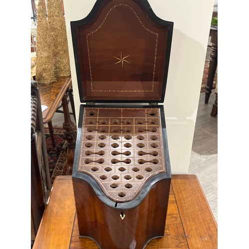 7612 - A 19th Century flame mahogany cutlery box with stringing, serpentine front, 37cm high