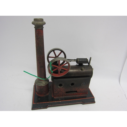 9547 - A Josef Falk live steam overtype stationary engine, the horizontal boiler on brickwork effect tinpla... 