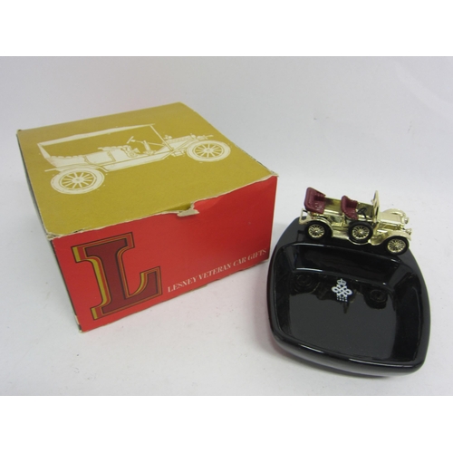 9233 - A boxed Lesney Veteran Car gift ceramic ashtray, mounted with diecast metal Daimler, paper presentat... 