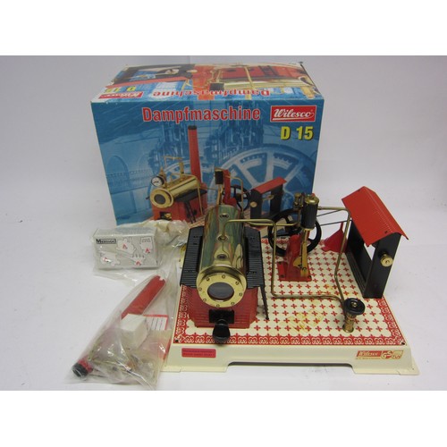 9568 - A boxed Wilesco D15 Dampfmaschine live steam stationary steam plant, the brass horizontal boiler pow... 