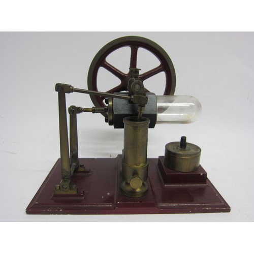 9545 - A Stirling hot air stationary engine with 9cm diameter flywheel, on heavy cast metal base, 15cm tall