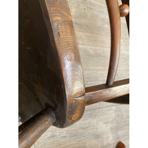 7607 - A 19th Century Mendlesham chair, shaped seat, H stretcher base, repair present