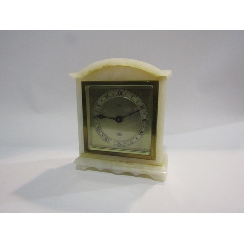 4381 - An Elliot polished marble mantel clock, Roman numeral dial