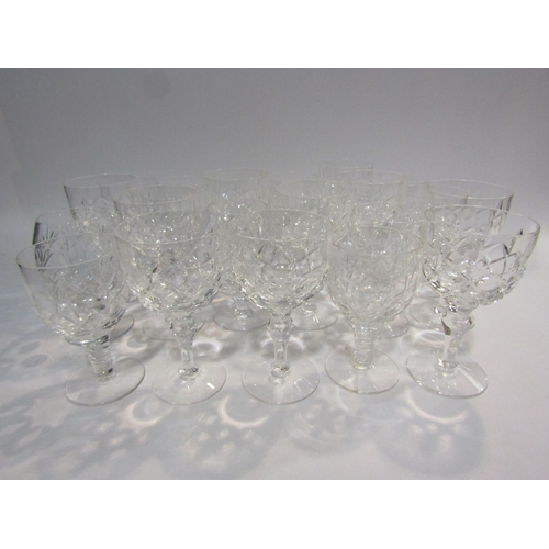 4385 - Ten cut glass wine glasses, eleven similar and two brandy balloons (23)