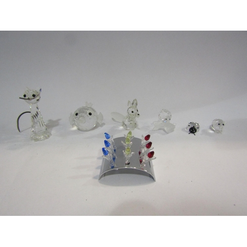 4393 - A collection of seven Swarovski crystal figures including ladybird, cat, fox, etc.