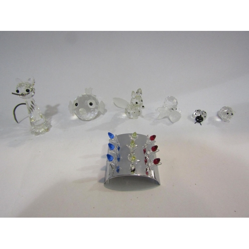 4393 - A collection of seven Swarovski crystal figures including ladybird, cat, fox, etc.