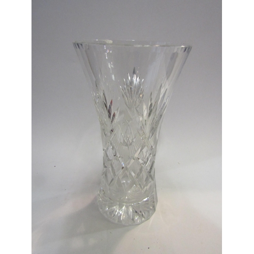 4400 - A heavy cut glass vase of waisted form, star cut base, 30cm tall             (E) £10-20