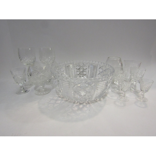 4402 - A selection of crystal glassware comprising various drinking glasses to include wine, brandy balloon... 