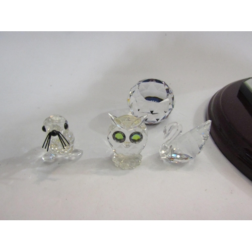 4419 - A collection of Swarovski crystal; seal, balls, owl, etc (8)