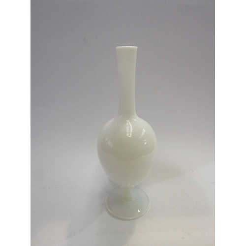 4431 - An opaque vaseline glass white pedestal vase marked Sevres, France, 32cm tall