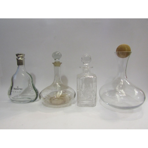 4441 - A cut glass whisky decanter of square form, a bulbous decanter and a Hennessy Paradis Extra Rare Cog... 