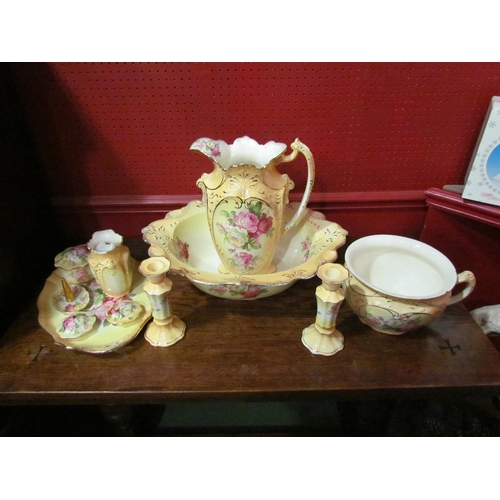 4038 - A blush wash set consisting of jug, wash bowl, dressing table set, etc., rose design, some pieces a/... 