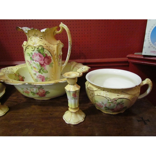 4038 - A blush wash set consisting of jug, wash bowl, dressing table set, etc., rose design, some pieces a/... 