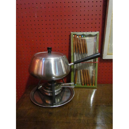 4059 - A Swiss made Spring stainless steel fondue set together with a set of twelve fondue forks     (R) £1... 