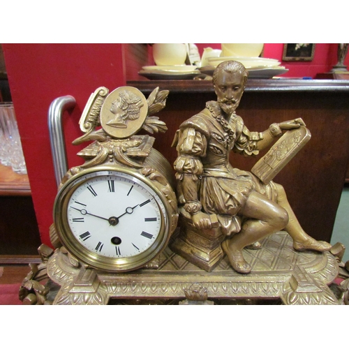 4092 - A gilt mantel clock surmounted by a 16th Century artist, one leg a/f, with key and pendulum