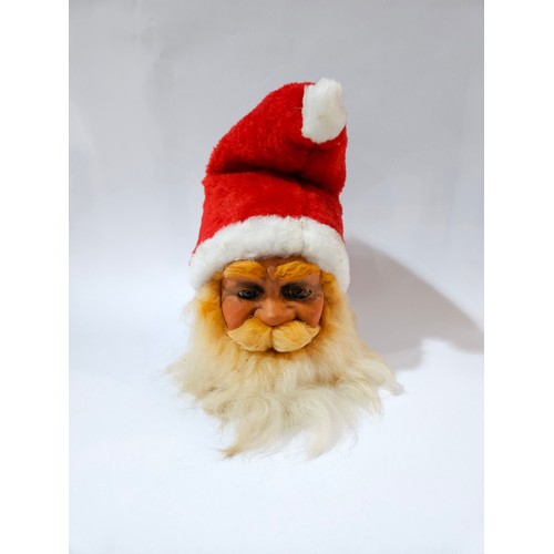 4009 - An automaton Santa's head with glass eyes