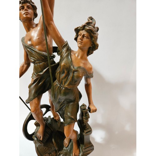 4032 - An Art Nouveau style sculpture of a couple in classical pose, 72cm tall   (E) £30-40