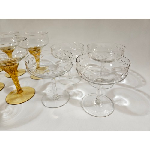 4098 - Ten champagne saucers with amber stems and four clear glass saucers