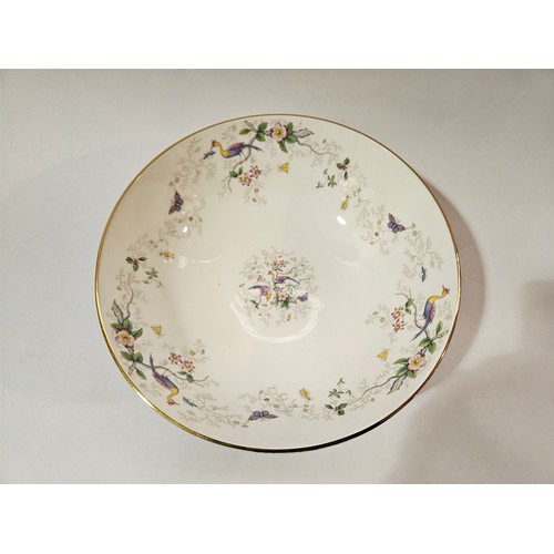 4117 - A Coalport bowl, white ground printed with exotic birds and branches, gilt rim, 26.5cm diameter