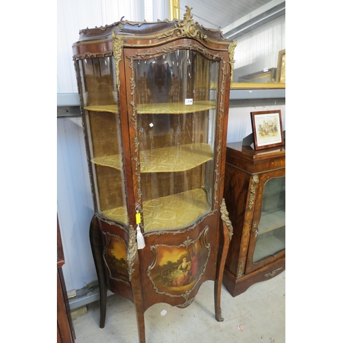 2133 - A late 19th Century continental vitrine with shaped glass, ormolu mount