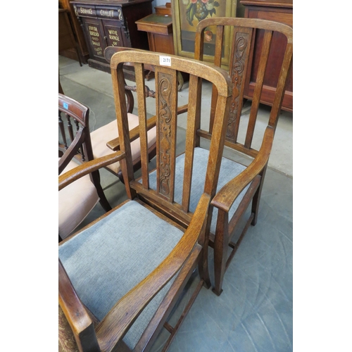 2160 - Two oak carver elbow chairs   (R)  £15