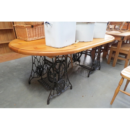 2259 - A pine top table with singer sewing machine bases    (R  £50