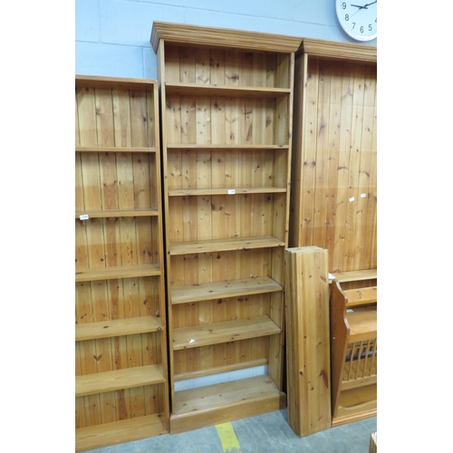 2291 - A pine full height bookcase, plinth base   (E)  £10-15