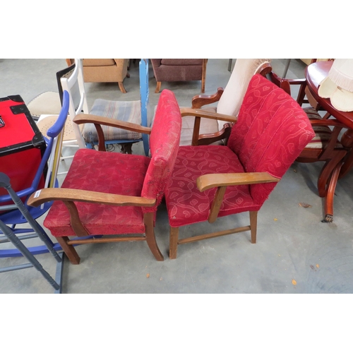 2404 - A pair of 1930's oak framed elbow chairs   (E)  £5-10