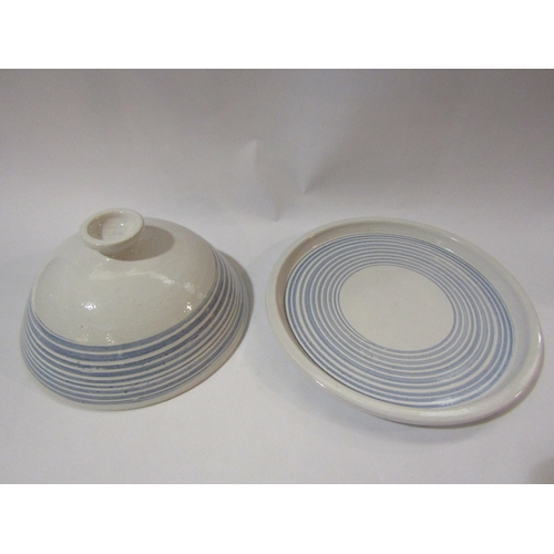 4250 - A studio pottery cheese dish and cover, white ground with blue hoops