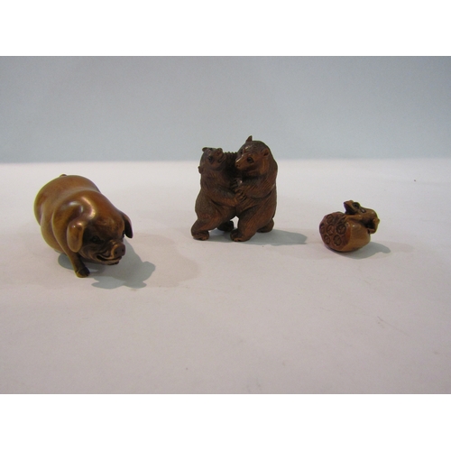 4364 - Three carved wooden netsukes to include a frog, bears and a pig, some signed