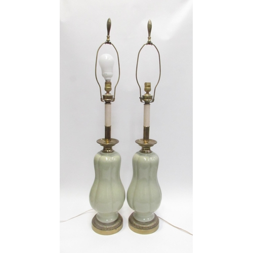 4037 - A pair of tall ceramic gourd form lamps with ormolu bases, 108cm total height