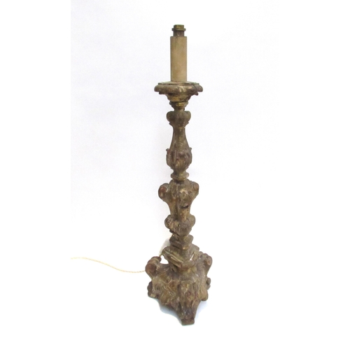 4378 - An 19th Century gilded wood pricket candlesticks converted to electricity with weighted lead to base... 