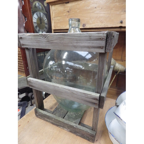 2040 - A pair of Vintage glass carboys in pine packing crates  (R)  £70