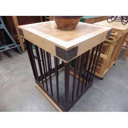 2046 - A maple butchers block on square iron slatted stand on oak feet 65cm sq