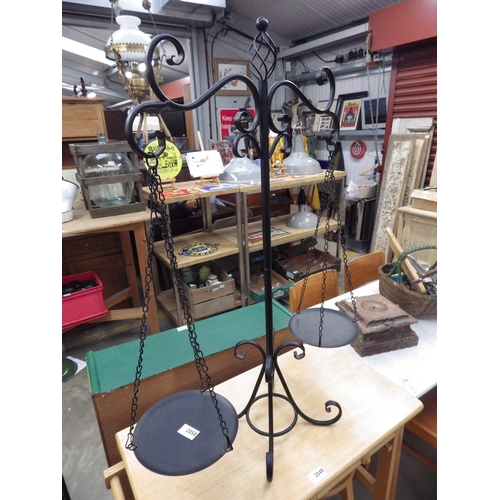 2050 - A decorative wrought iron set of balance scales   (R)  £15