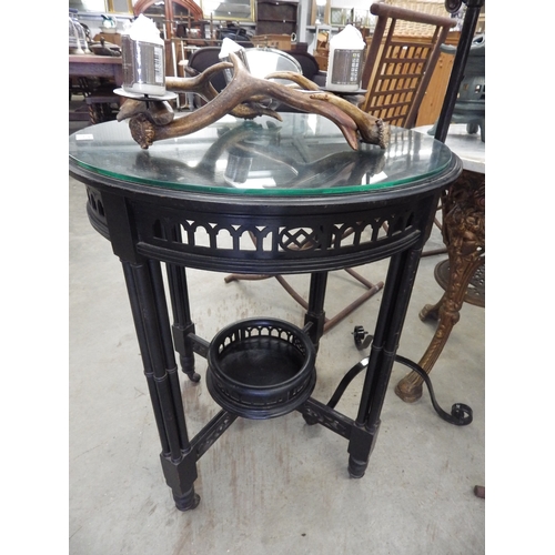 2078 - A late Victorian circular ebonised and glass top occasional table with cluster collumn legs