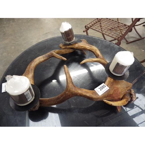 2080 - An antler three arm candle holder