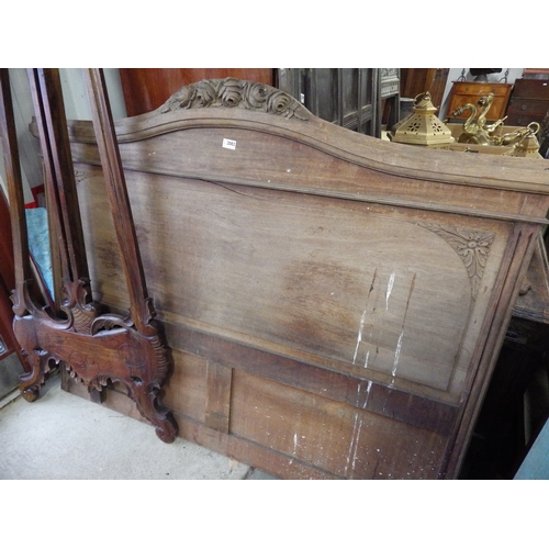 2082 - A French mahogany bedhead and a Georgian oak dresser top (2)